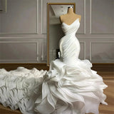 Ellegant Mermaid Wedding Gown. Ruffeled bridal gown with train.