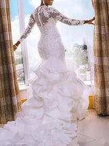 Ruffeled Mermaid Wedding dress. Lace Long sleeved wedding gown
