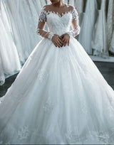 Custom  Made Ball Gown Bridal Dress with long covered lace sleeves. Covered Chest, Back and neck.