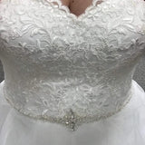 Organza ruffle and lace ball gown wedding dress at Bling Brides Bouquet